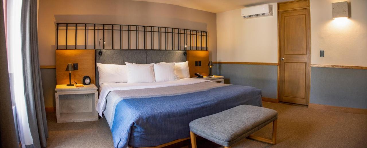 Hotel Hacienda Jurica By Brisas à Querétaro Extérieur photo A room at the hotel